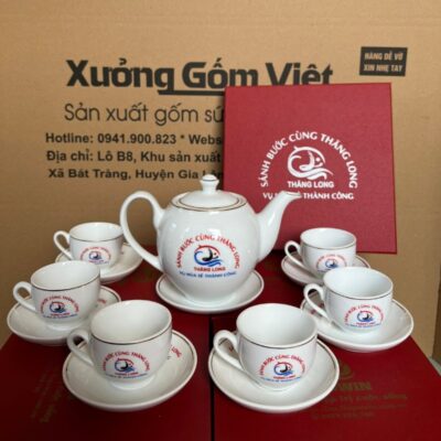 Bộ ấm chén gốm sứ Bát Tràng in logo công ty Thăng Long dáng bầu tròn màu trắng XG-AC103