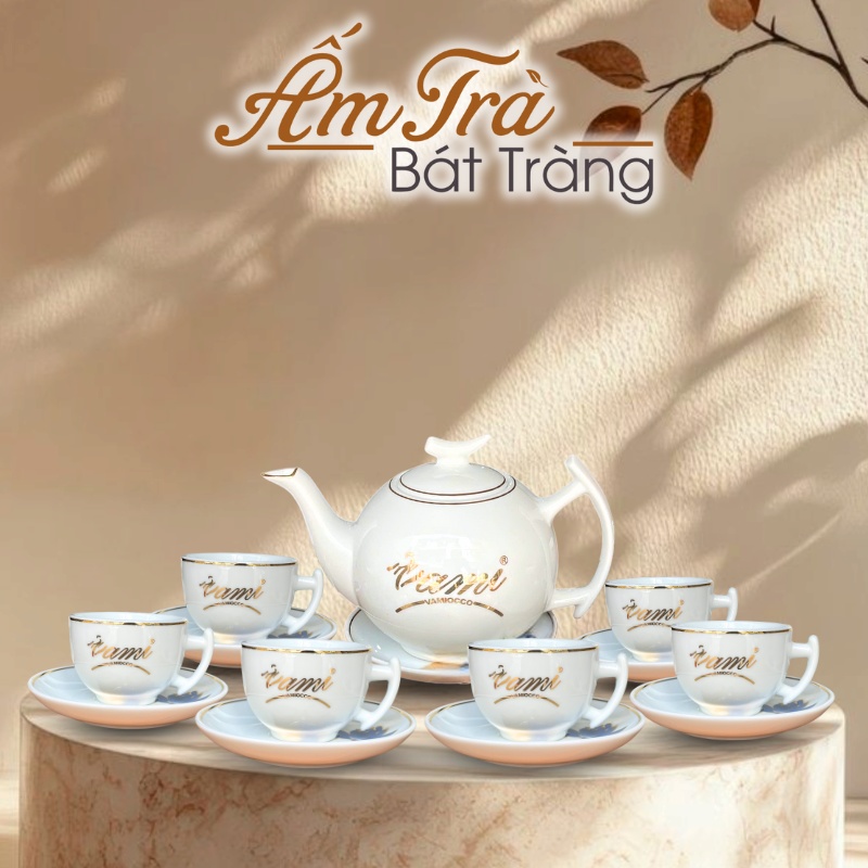 bo-am-tra-ve-tay-dang-buoi-canh-hoa-tiet-hoa-sen-vang-kim-in-logo-atbt-vt01 (1)