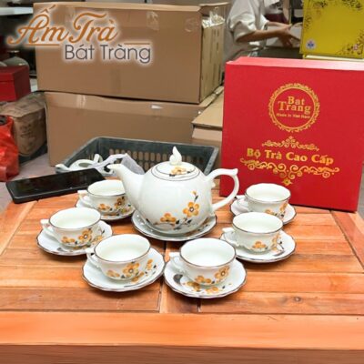 bo-am-chen-ve-tay-in-logo-hoa-tiet-hoa-mai-dang-buoi-lua-atbt-vt14 (3)