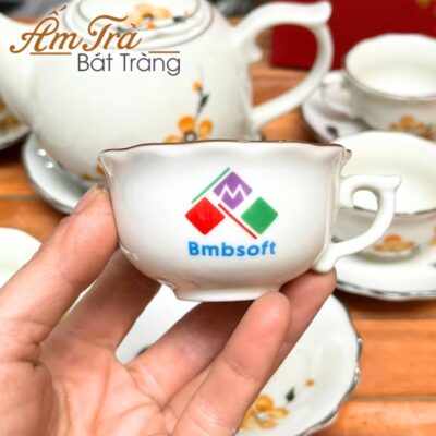 bo-am-chen-ve-tay-in-logo-hoa-tiet-hoa-mai-dang-buoi-lua-atbt-vt14 (6)