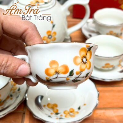 bo-am-chen-ve-tay-in-logo-hoa-tiet-hoa-mai-dang-buoi-lua-atbt-vt14 (7)